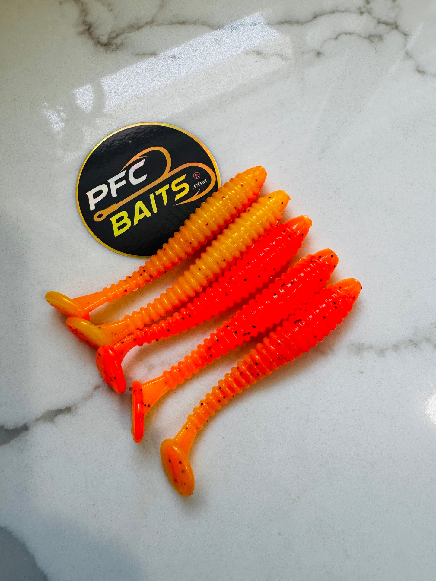 3 Inch RIP shad swim baits (orange and yellow)